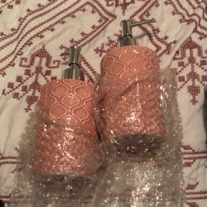 Yep pink soap dispensers